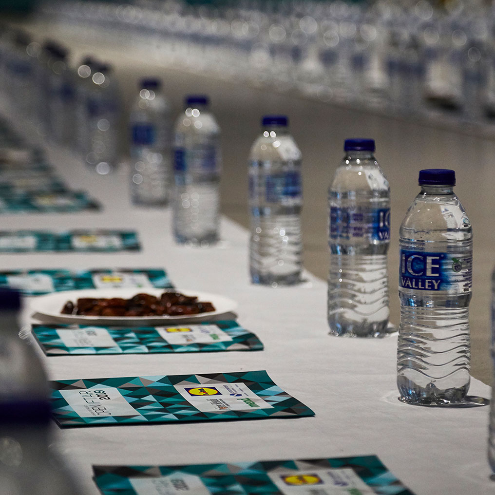 Water bottles and dates laying on table
