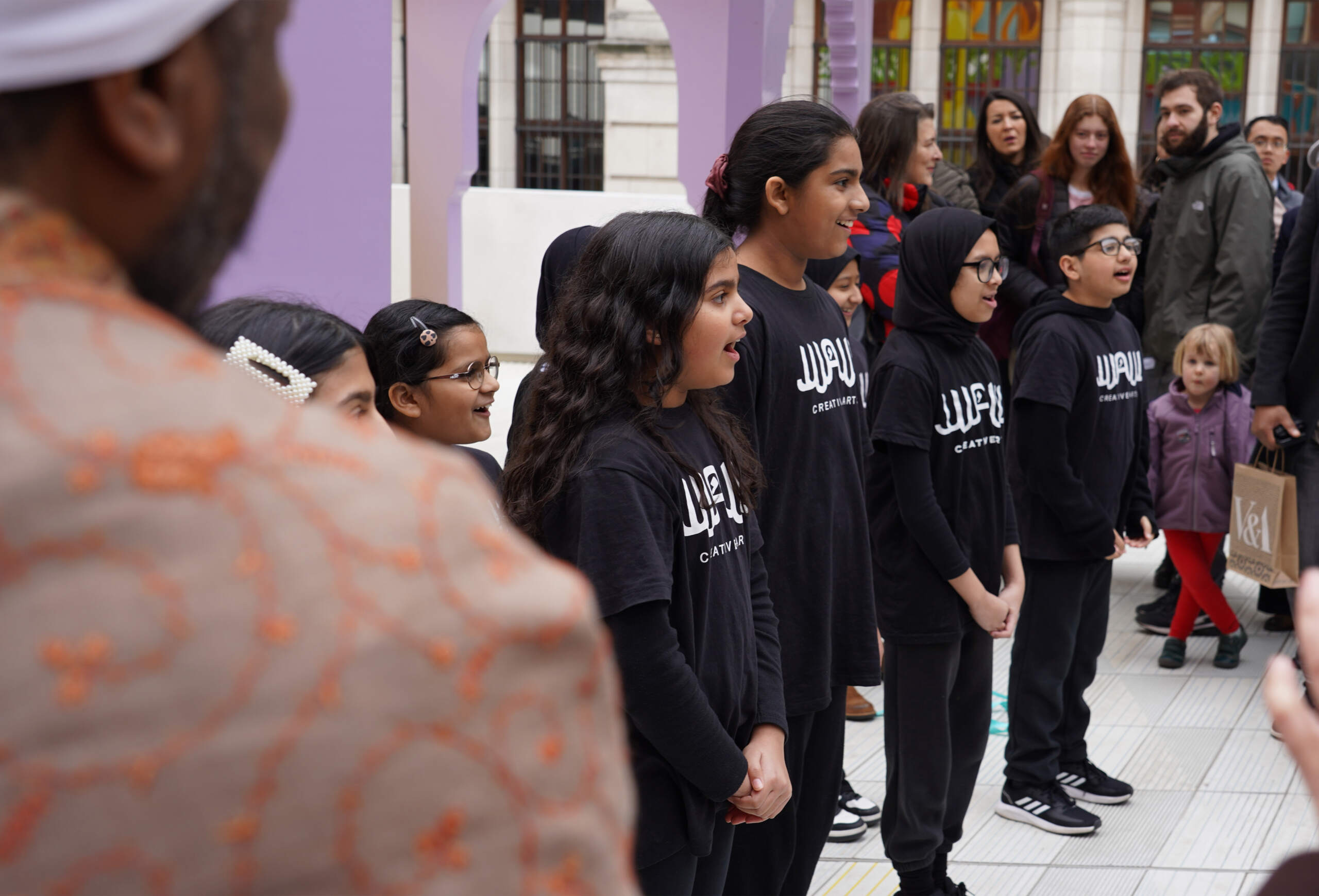 A bunch of Children singing something