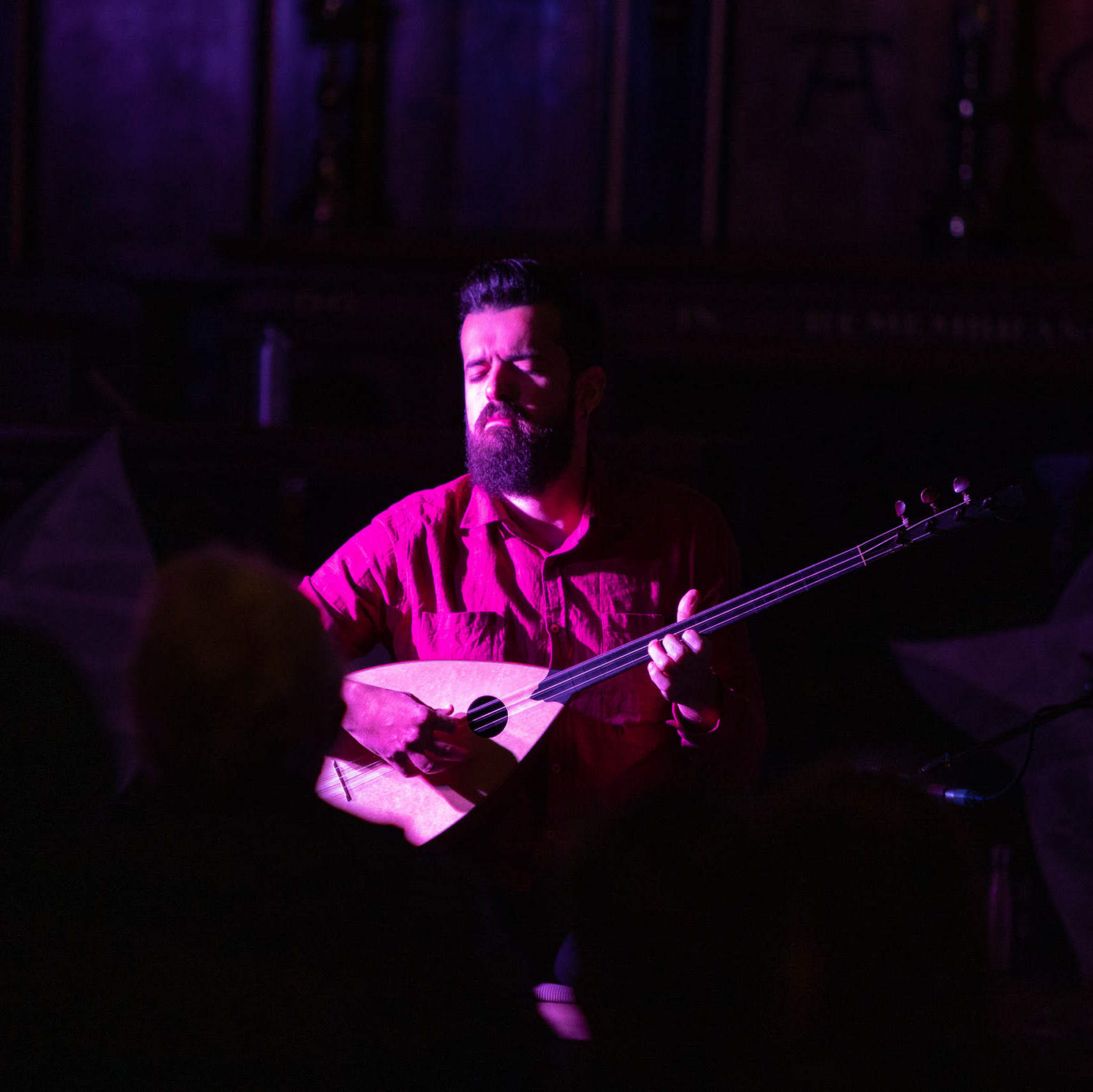 A man holding the guitar .